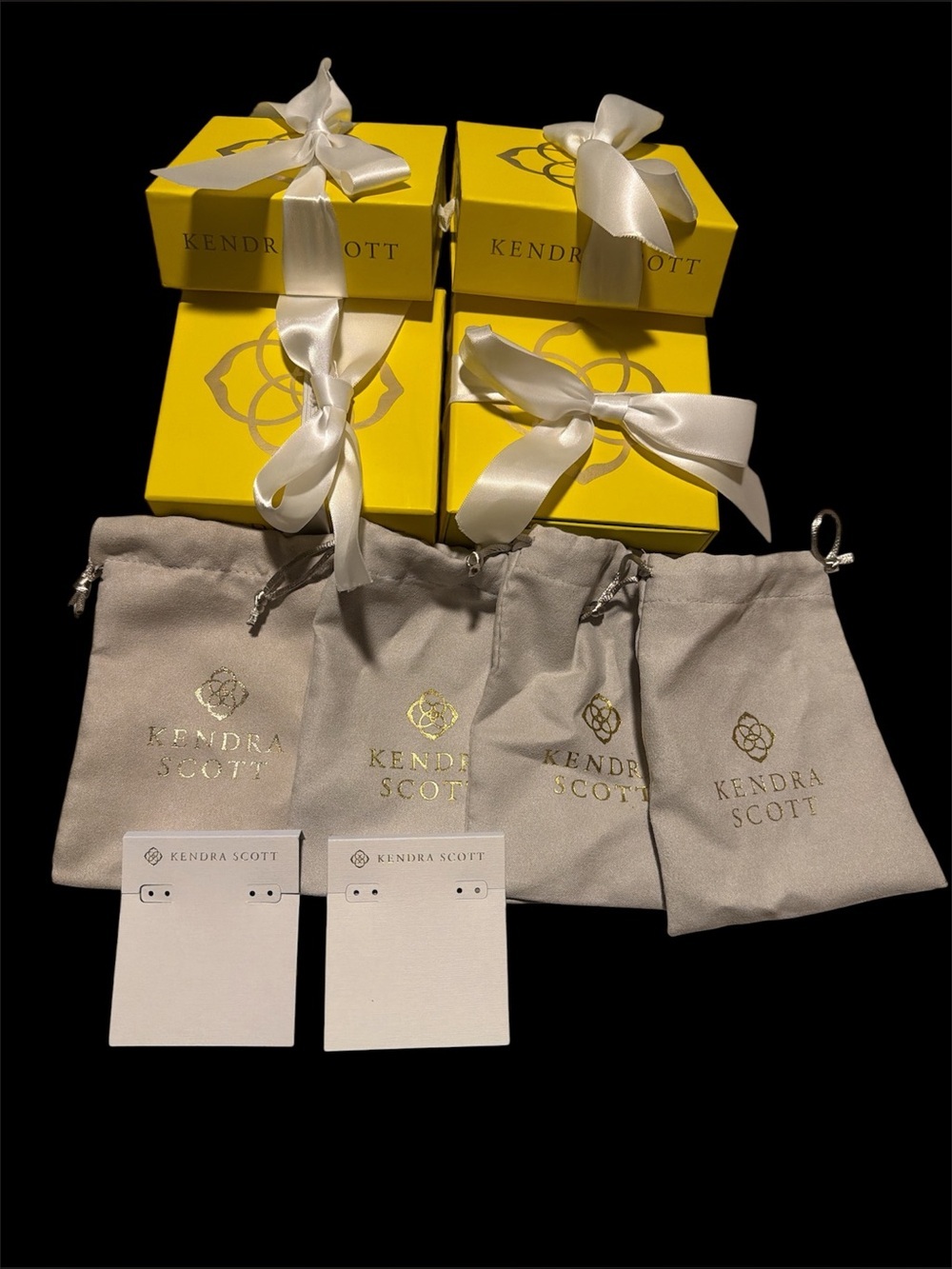 4 Kendra Scott Cream Jewelry Pouches with White Display Cards